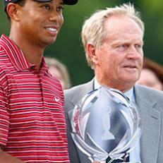 Jack Nicklaus presents Tiger Woods with the trophy after his one-stroke victory at the Memorial Tournament at the Muirfield Village Golf Club.
