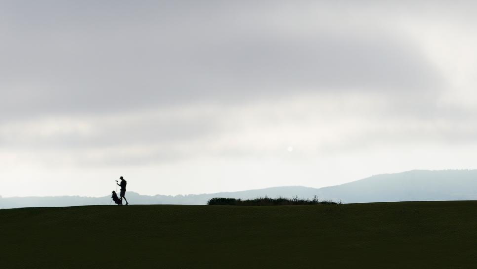 editors-letter-silhouetted-golfer-staff.jpg