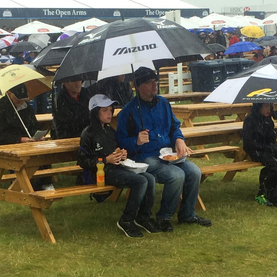 royal-troon-spectators-eating-in-rain.jpg
