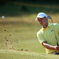 Jordan Spieth of the United States hits a shot out of a bunker on the 4th green during a practice round ahead of the British Open Golf Championship, at Royal Birkdale, Southport, England Tuesday, July 18, 2017. (AP Photo/Dave Thompson)