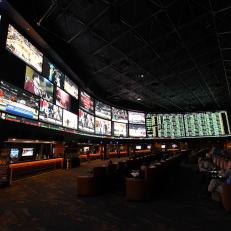 Some of the nearly 400 Super Bowl 50 proposition bets are displayed at the Race & Sports SuperBook at the Westgate Las Vegas Resort & Casino on February 2, 2016 in Las Vegas, Nevada. The newly renovated sports book has the world\'s largest indoor LED video wall with 4,488 square feet of HD video screens measuring 240 feet wide and 20 feet tall.