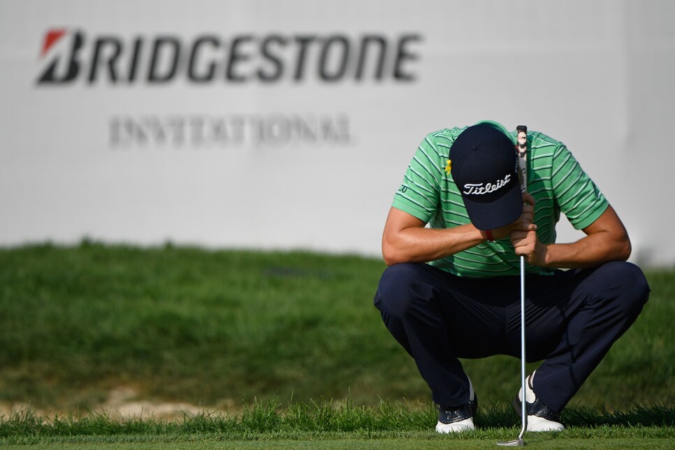 justin-thomas-wgc-bridgestone-2018-sunday-head-down-emotional-18th.jpg AKRON, OH - AUGUST 05: Justin Thomas gets emotional before his victory at the World Golf Championships-Bridgestone Invitational at Firestone Country Club on August 5, 2018 in Akron, Ohio. (Photo by Chris Condon/PGA TOUR)