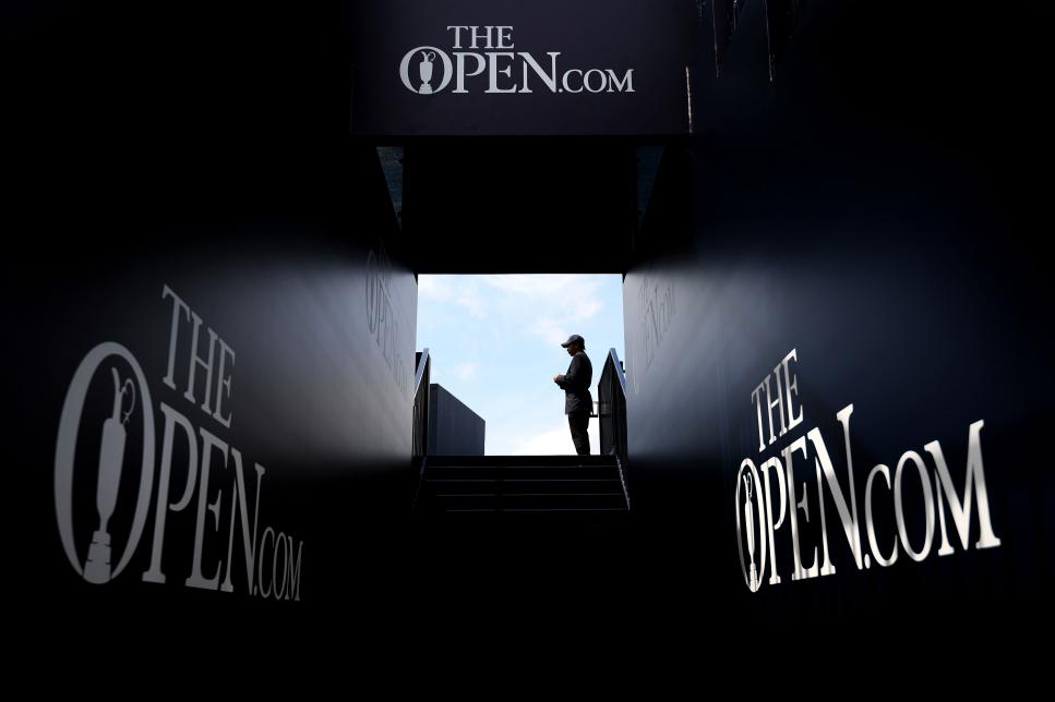 PORTRUSH, NORTHERN IRELAND - JULY 15: A security guard looks out over the players tunnel to the first tee during a practice round prior to the 148th Open Championship held on the Dunluce Links at Royal Portrush Golf Club on July 15, 2019 in Portrush, United Kingdom. (Photo by Richard Heathcote/R&A/R&A via Getty Images )