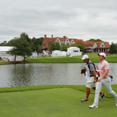 ATLANTA, GEORGIA - AUGUST 25: Rory McIlroy of Northern Ireland and caddie Harry Diamond walk during the final round of the TOUR Championship at East Lake Golf Club on August 25, 2019 in Atlanta, Georgia. (Photo by Kevin C. Cox/Getty Images)