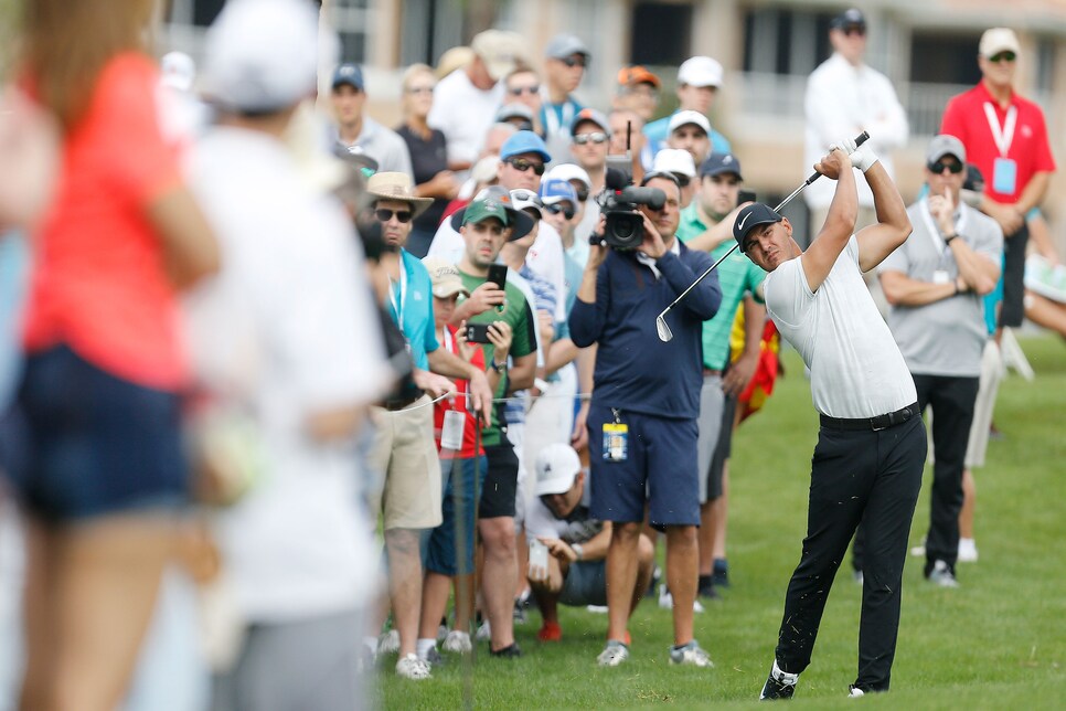 brooks-koepka-honda-classic-2019-hitting-iron-fans.jpg