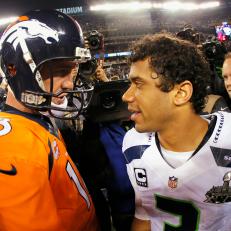 EAST RUTHERFORD, NJ - FEBRUARY 02:  (L-R) Quarterback Peyton Manning #18 of the Denver Broncos congratulates quarterback Russell Wilson #3 of the Seattle Seahawks on their 43-8 win during Super Bowl XLVIII at MetLife Stadium on February 2, 2014 in East Rutherford, New Jersey.  (Photo by Kevin C. Cox/Getty Images)