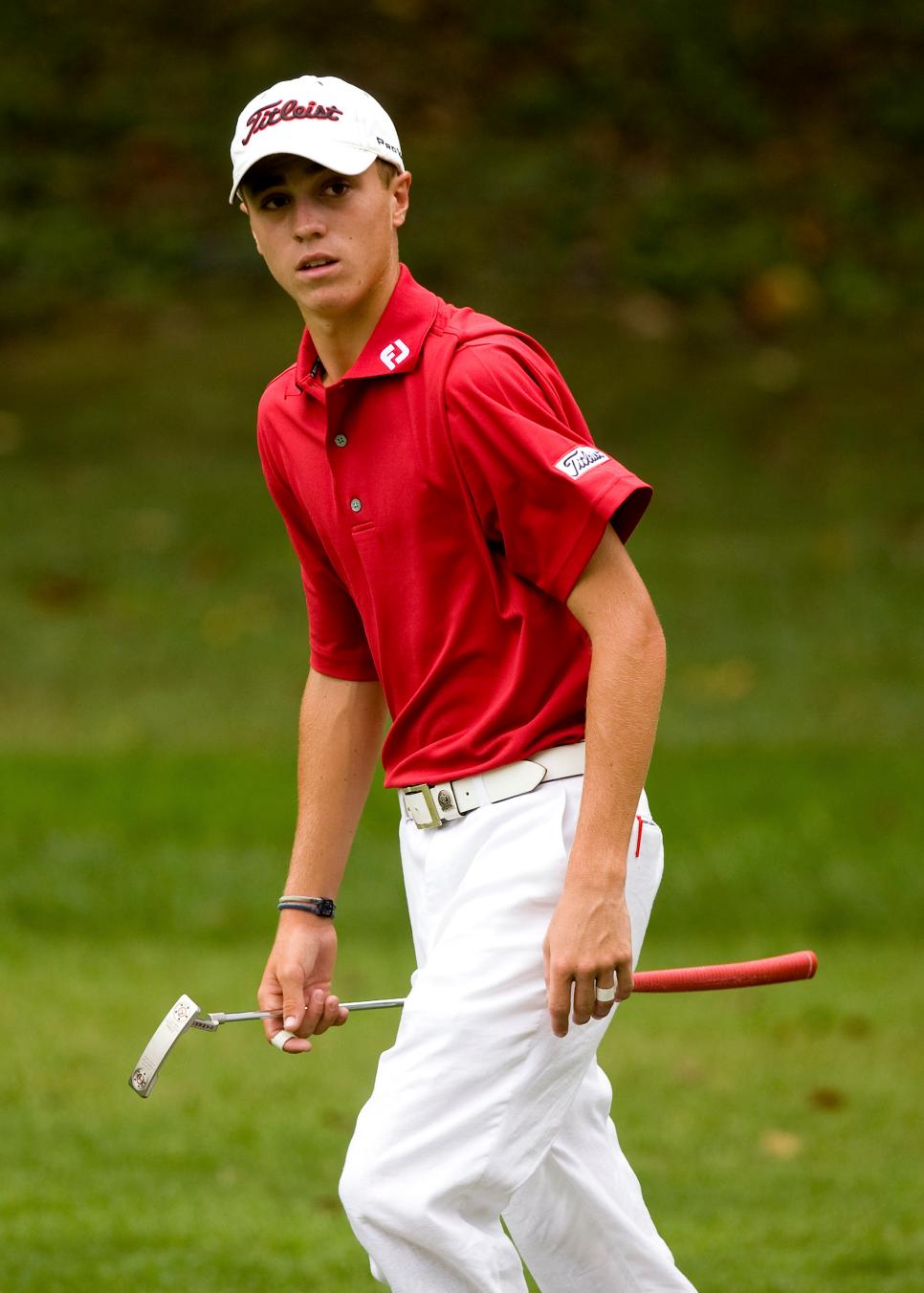 GREENSBORO, NC - AUGUST 22: Justin Thomas walks up the 10th hole after hitting his approach shot during the third round of the Wyndham Championship at Sedgefield Country Club  on August 22, 2009 in Greensboro, North Carolina. (Photo by Chris Keane/Getty Images)