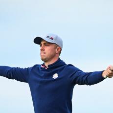 SHEBOYGAN, WI - SEPTEMBER 24:  Justin Thomas raises his arms and putter as he celebrates making an eagle putt on the 16th hole green during Friday Afternoon Four-ball Matches of the 43rd Ryder Cup at Whistling Straits on September 24, 2021 in Sheboygan, Wisconsin. (Photo by Keyur Khamar/PGA TOUR via Getty Images)