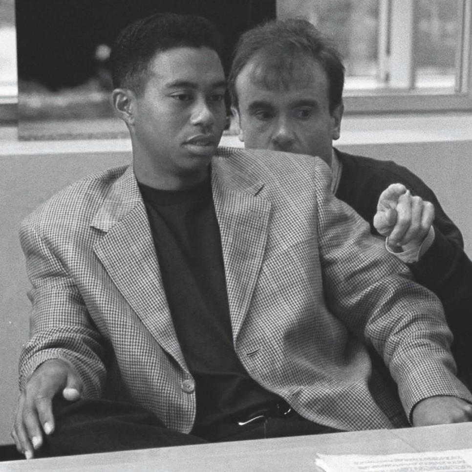 Golf: Casual portrait of Tiger Woods judging product designs with agent Hughes Norton at Nike Headquarters. Beaverton, OR 11/13/1996 CREDIT: Lynn Johnson (Photo by Lynn Johnson /Sports Illustrated via Getty Images/Getty Images) (Set Number: X51786 )