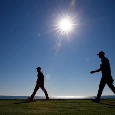 SHEBOYGAN, WI - AUGUST 11:  Tiger Woods of the United States walks with his coach Chris Como during a practice round prior to the 2015 PGA Championship at Whistling Straits on August 11, 2015 in Sheboygan, Wisconsin.  (Photo by Jamie Squire/Getty Images)