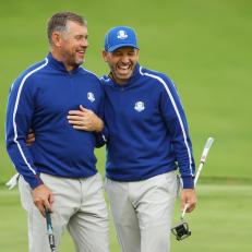 KOHLER, WISCONSIN - SEPTEMBER 21: Lee Westwood of England and team Europe (L) and Sergio Garcia of Spain and team Europe react on the 18th green prior to the 43rd Ryder Cup at Whistling Straits on September 21, 2021 in Kohler, Wisconsin. (Photo by Andrew Redington/Getty Images)