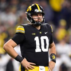 INDIANAPOLIS, IN - DECEMBER 02: Iowa Hawkeyes Quarterback Deacon Hill (10) looks on during the Big Ten Championship Game between the Michigan Wolverines and the Iowa Hawkeyes on December 2, 2023, at Lucas Oil Stadium in Indianapolis, Indiana. (Photo by Michael Allio/Icon Sportswire via Getty Images)