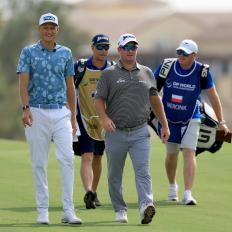 DUBAI, UNITED ARAB EMIRATES - NOVEMBER 16: Ryan Fox of New Zealand walks to his second shot on the third hole with Adrian Meronk of Poland during the first round on Day One of the DP World Tour Championship on the Earth Course at Jumeirah Golf Estates on November 16, 2023 in Dubai, United Arab Emirates. (Photo by David Cannon/Getty Images)