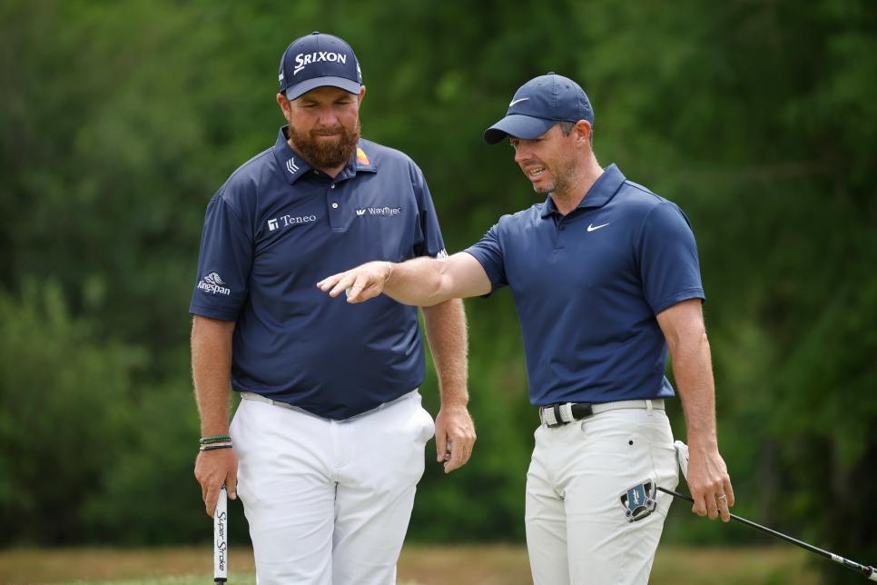 AVONDALE, LOUISIANA - APRIL 27: (L-R) Shane Lowry of Ireland and Rory McIlroy of Northern Ireland speak on the second green during the third round of the Zurich Classic of New Orleans at TPC Louisiana on April 27, 2024 in Avondale, Louisiana. (Photo by Chris Graythen/Getty Images)