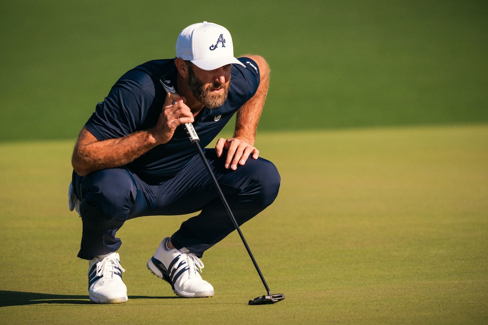 /content/dam/images/golfdigest/fullset/2025/4/dustin-johnson-masters-2025-friday-reading-putt.jpg