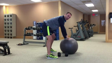 Dumbbell Bent-Over One-Arm Rows On A Physio Ball