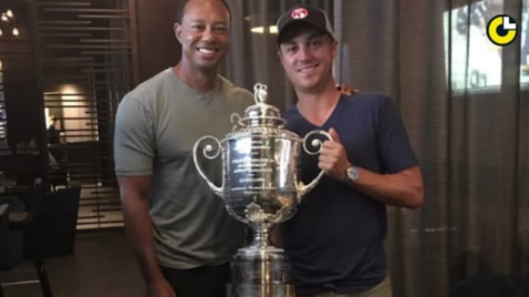 Justin Thomas celebrates his PGA win with Tiger Woods