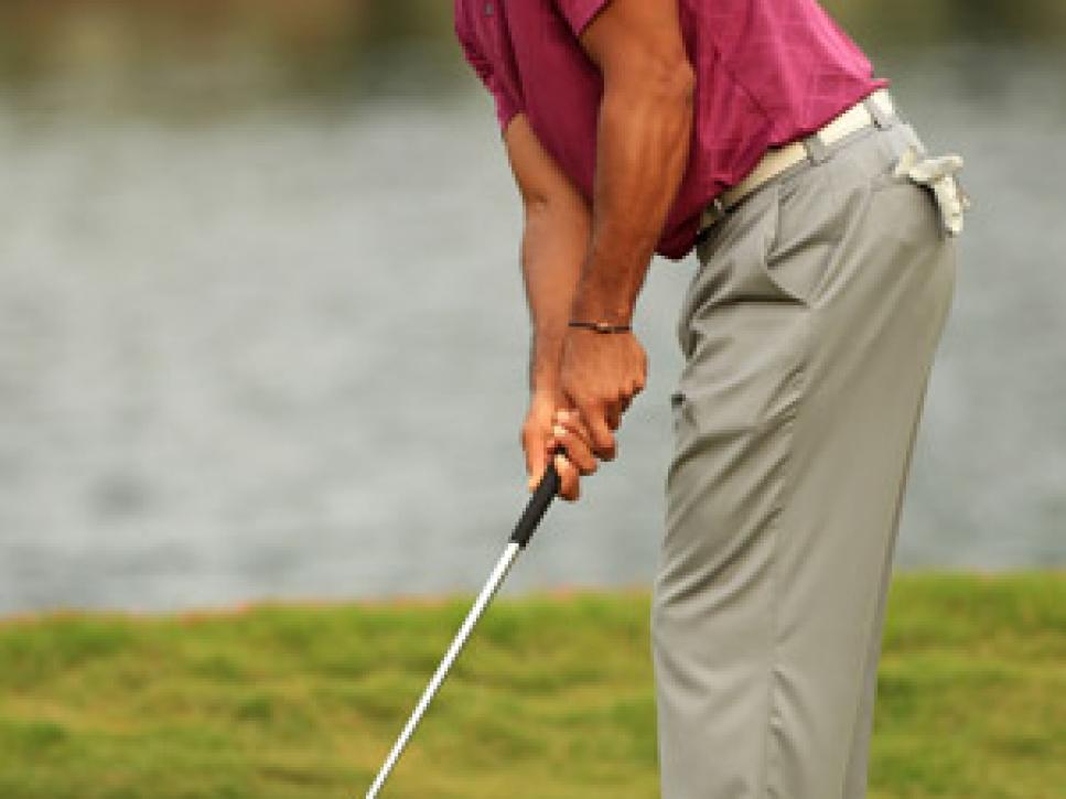 /content/dam/images/golfdigest/fullset/2015/07/20/55ad73fcadd713143b4254ee_golf-tours-news-blogs-local-knowledge-assets_c-2011-05-tiger_putting__players_300-thumb-300x450-32402.jpg