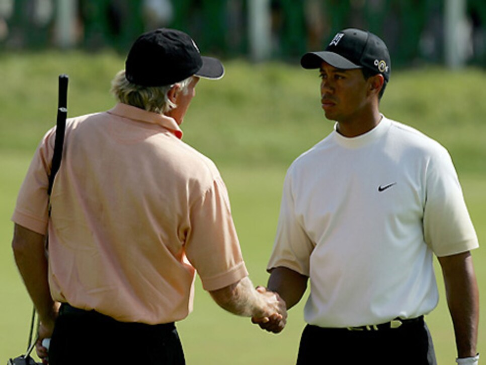 /content/dam/images/golfdigest/fullset/2015/07/20/55ad75c4b01eefe207f6bd9c_golf-tours-news-blogs-local-knowledge-assets_c-2012-09-greg_norman_tiger_woods_470-thumb-470x337-78942.jpg