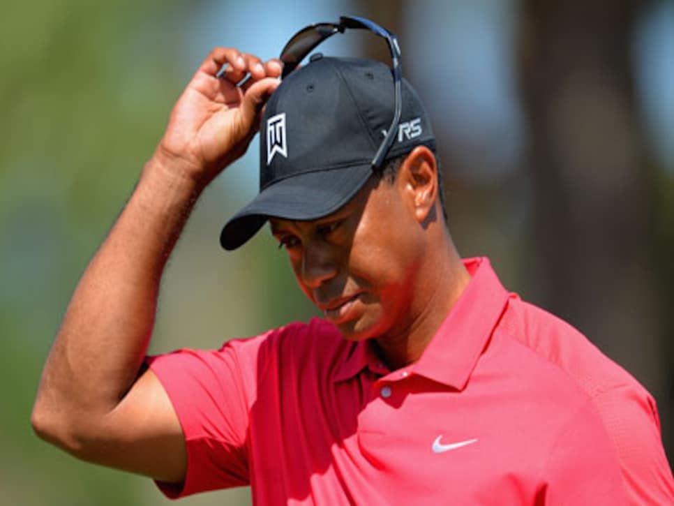 /content/dam/images/golfdigest/fullset/2015/07/20/55ad780cb01eefe207f6d6cf_golf-tours-news-blogs-local-knowledge-assets_c-2014-03-blog-tiger-woods-0302-thumb-470x313-115763.jpg