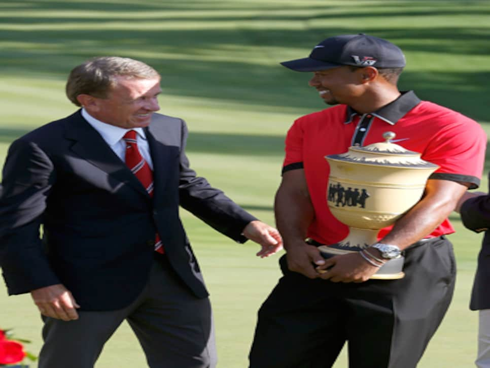 /content/dam/images/golfdigest/fullset/2015/07/20/55ad79c4b01eefe207f6ecd9_blogs-the-loop-assets_c-2014-07-tiger-woods-tim-finchem-350-thumb-350x445-136901.jpg