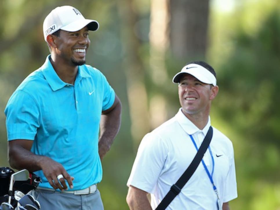 /content/dam/images/golfdigest/fullset/2015/07/20/55ad7a38add713143b42a61a_blogs-the-loop-assets_c-2014-08-140825-foley-tiger-518-thumb-518x380-137789.jpg