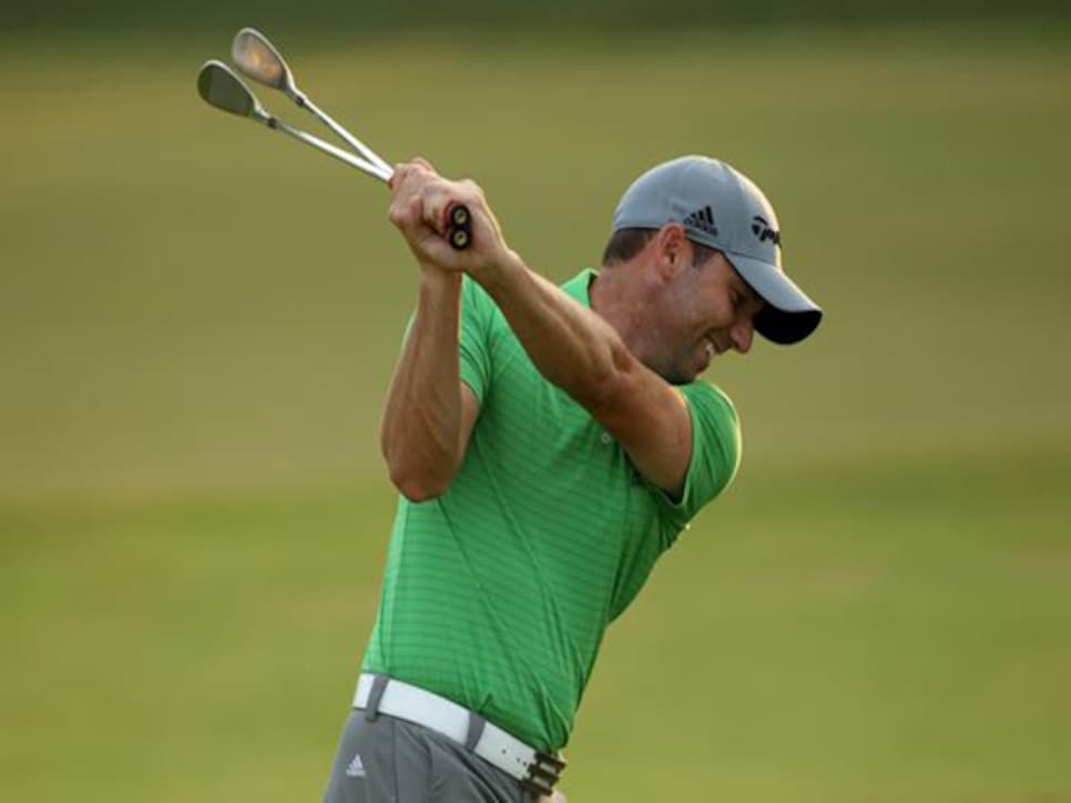 /content/dam/images/golfdigest/fullset/2015/07/20/55ad7b8aadd713143b42b8d9_blogs-the-loop-sergio-garcia-swinging-two-clubs.jpg