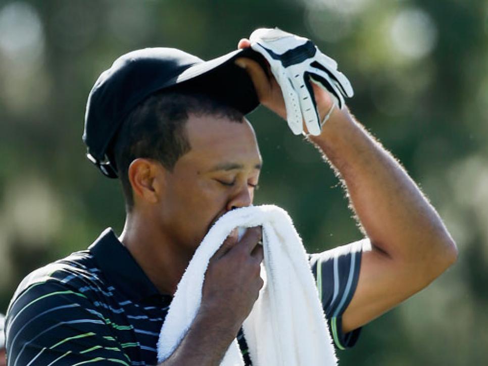/content/dam/images/golfdigest/fullset/2015/07/20/55ad7bdfb01eefe207f70a89_blogs-the-loop-blog-tiger-woods-early-1204.jpg