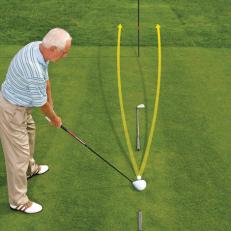 BECOME A SHOTMAKER: Stick a shaft or umbrella in front of your ball to see where it starts.