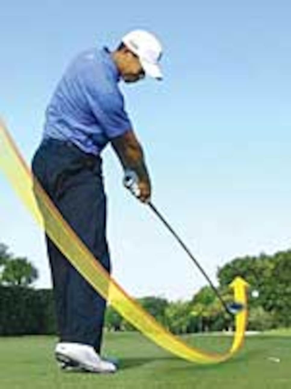 instruction-2009-09-inar02_woods_putt_flick.jpg