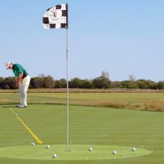 ZEROING IN: To get better on long lags, practice putting balls into a three-foot circle around the hole.