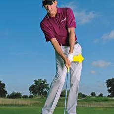 GO TO THE LOGO: At impact try to get the back of your lead hand pointing to the target.
