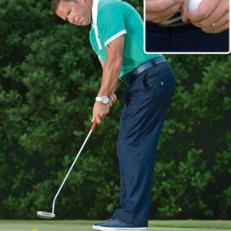 KEEP YOUR VISION QUIET: Focus on a dot on the ball to avoid tracking the putter with your eyes.