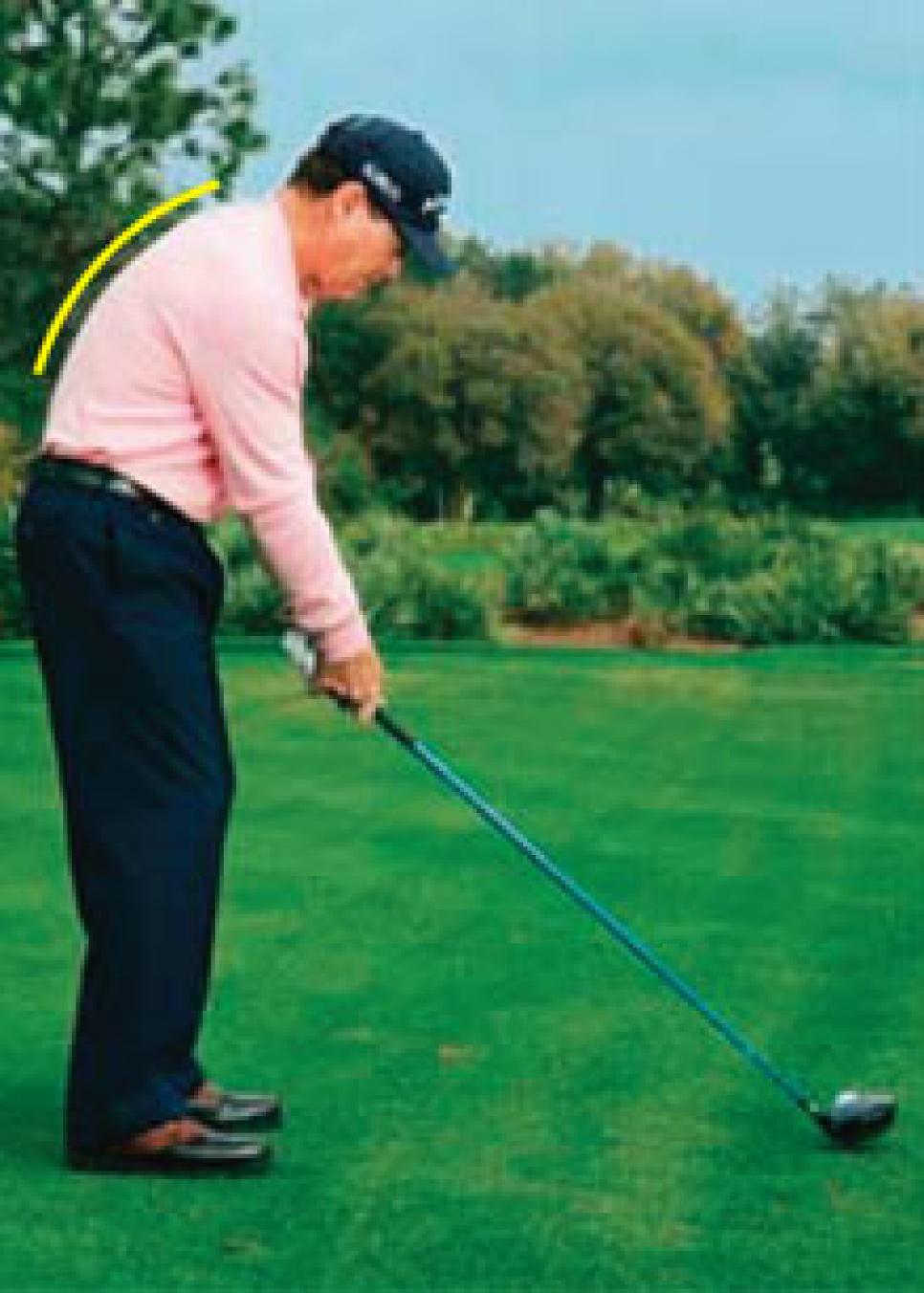 Why standing tall over the ball is so important | How To | Golf Digest