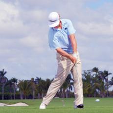 "People talk about being wide on the backswing, but distance comes from width at impact," Rose says. "You want your left arm and the shaft fully extended for maximum speed." Hoffman has a Nicklaus-like head position here--well behind the ball--and his left wrist has gone from cupped to flat, another speed producer.