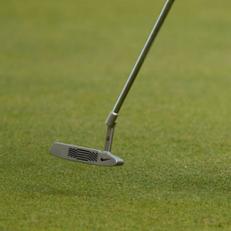 Face Of Change: Woods\' new putter featured polymer-filled grooves.