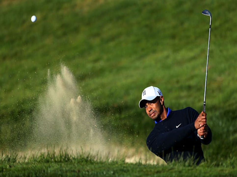 /content/dam/images/golfdigest/fullset/2015/07/21/55ada49aadd713143b43f97b_golfworld-2012-06-gwar_tiger_sirak_0612.jpg