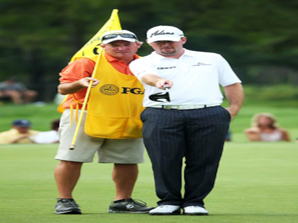 /content/dam/images/golfdigest/fullset/2015/07/21/55ada52eadd713143b43ff98_golfworld-2013-08-gwar02-robert-garrigus-rosaforte-report.jpg