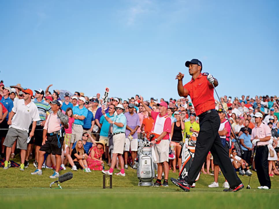 /content/dam/images/golfdigest/fullset/2015/07/21/55ada581b01eefe207f843b7_golfworld-2013-05-gwsl09-tiger-twirl-pose.jpg