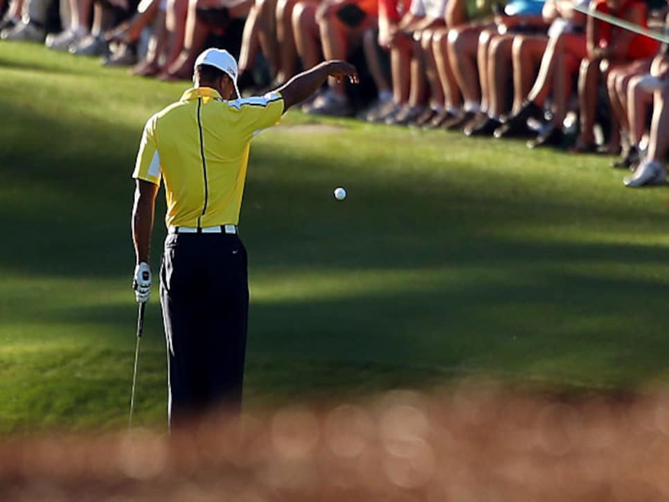 /content/dam/images/golfdigest/fullset/2015/07/21/55ada5acb01eefe207f84566_golfworld-2013-11-tiger-woods-masters-drop.jpg