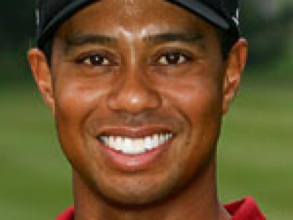 Tiger Woods, T-12, 282 (-2)
