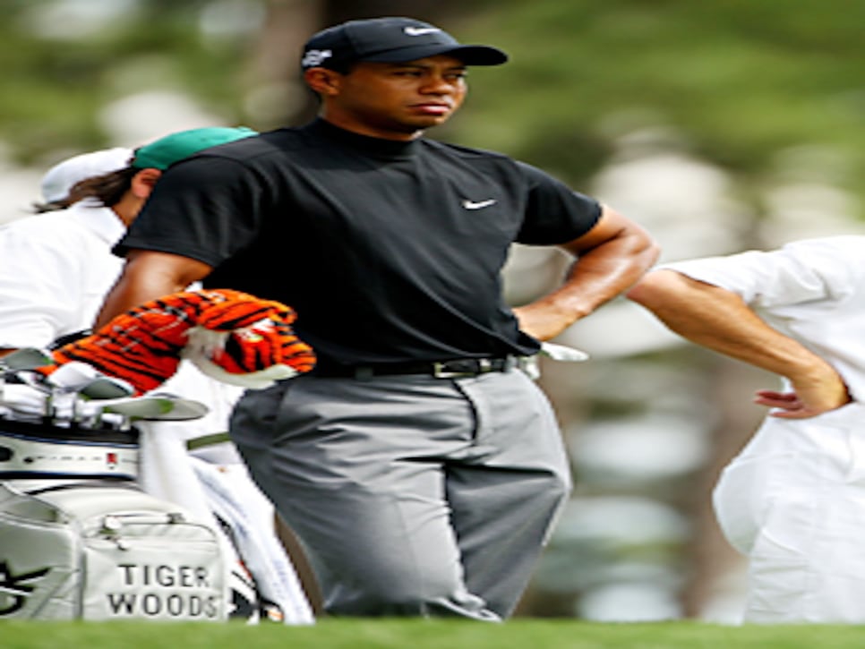 /content/dam/images/golfdigest/fullset/2015/07/21/55adaa3aadd713143b44300c_golfworld-2008-04-gwar01_080411tigersirak.jpg