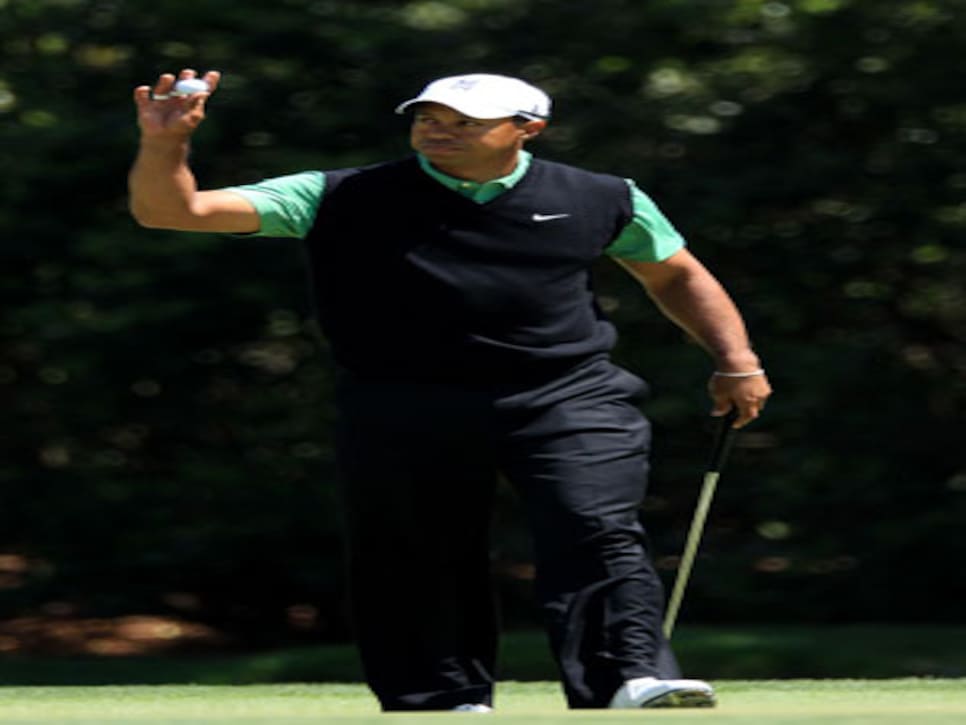 /content/dam/images/golfdigest/fullset/2015/07/21/55adaabfb01eefe207f874eb_golfworld-2010-04-gwar01-tiger-ap-0409-300.jpg