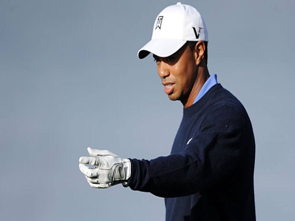 /content/dam/images/golfdigest/fullset/2015/07/21/55adaf04add713143b445d8b_golfworld-2010-06-gwar01_tiger_sirak_0616.jpg