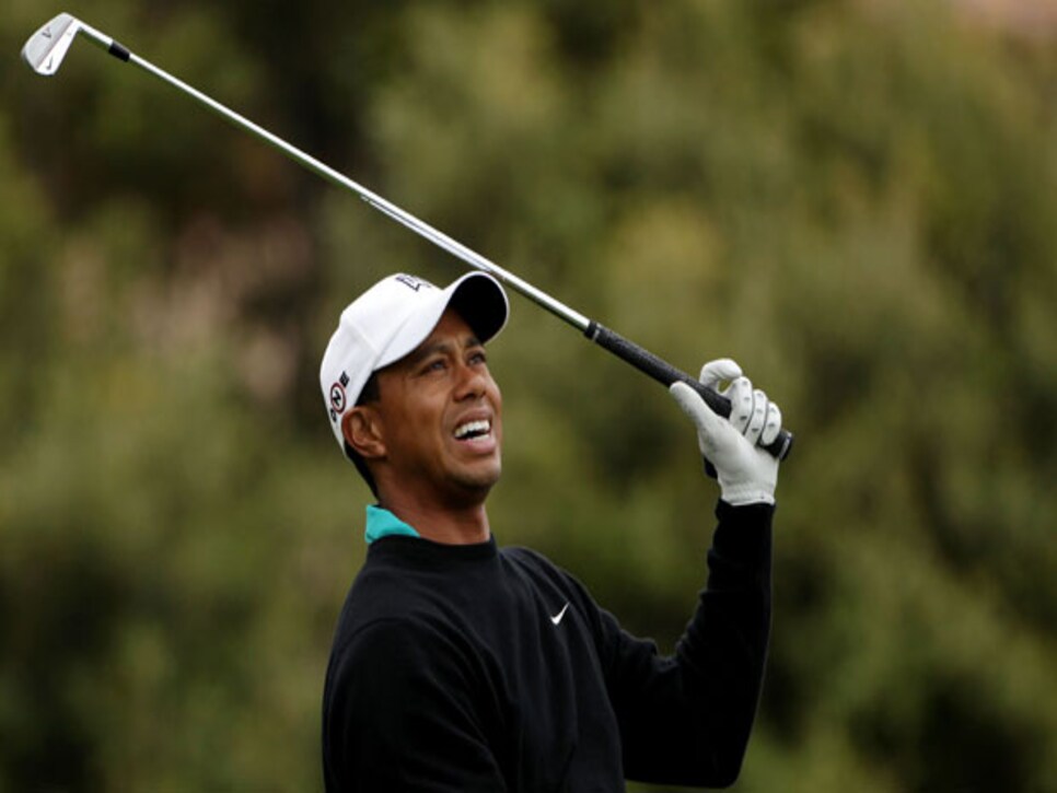 /content/dam/images/golfdigest/fullset/2015/07/21/55adaf05add713143b445d9c_golfworld-2010-06-gwar01-tiger-sirak-0618.jpg