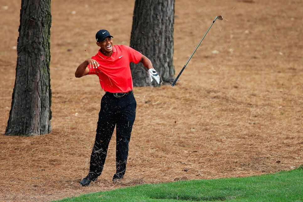 tiger-woods-masters-2015-wrist-injury.jpg