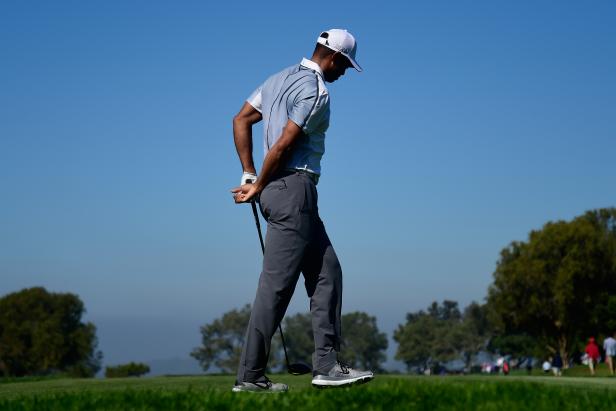 How golfers with back issues should adjust their swings, according to a ...