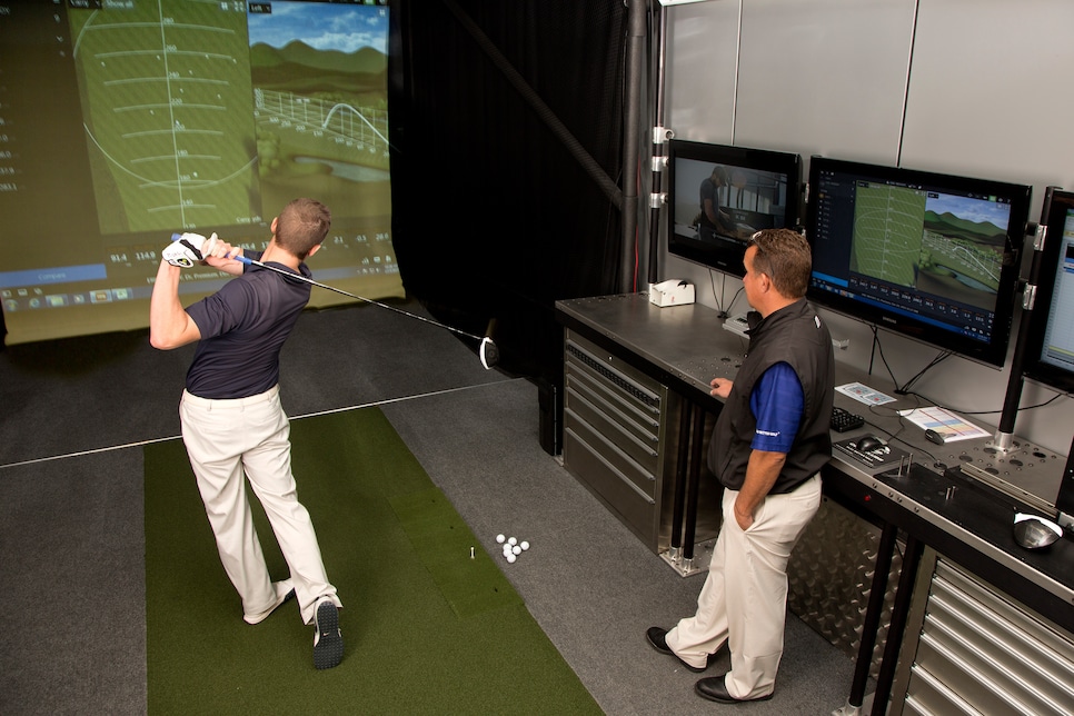 cool-clubs-clubfitting-customer-driving-bay.jpg