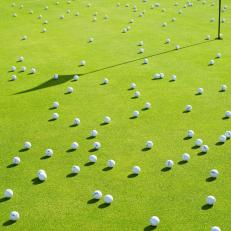 golf-balls-scattered-on-green.jpg