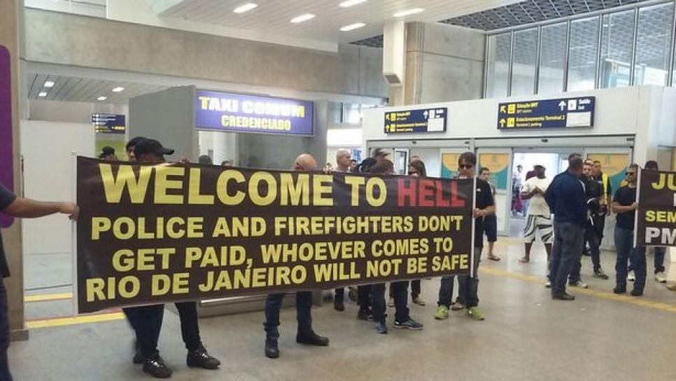 rio-airport-protest-welcome-to-hell-sign.jpg